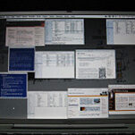 A computer screen filled with open files and textboxes.