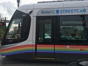 Rainbow wrapped Ride KC streetcar.